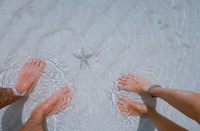 feet soaking in ocean saltwater Remedies for Toenail Fungus
